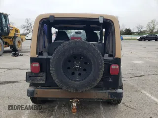 2000 Jeep Wrangler SE with VIN 1J4FA29PXYP746021, listed as a Copart auction lot 51023485 with 0 mi miles and Salvage Title. Bid and sale history available at carsss.com. Image 6.