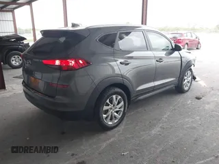 2021 Hyundai Tucson Value z VIN KM8J33A47MU309988, wystawiony jako IAAI lot #41749644 z przebiegiem 61 197 mil mil oraz . Historia ofert i sprzedaży dostępna na DreamBid. Obrazek 4.