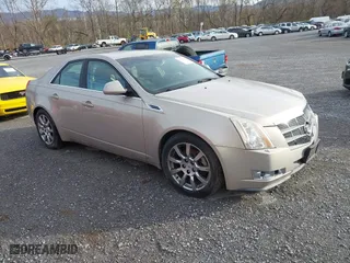 2009 Cadillac CTS AWD w/1SB with VIN 1G6DT57V090154165, listed as a IAAI auction lot 41907798 with 167,874 mi miles. Bid and sale history available at carsss.com. Image 1.