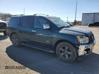 2005 Nissan Armada LE z VIN 5N1AA08A05N710696, wystawiony jako Copart lot #46854495 z przebiegiem 211 883 mil mil oraz Szkoda całkowita • Salvage title. Historia ofert i sprzedaży dostępna na DreamBid. Obrazek 4.