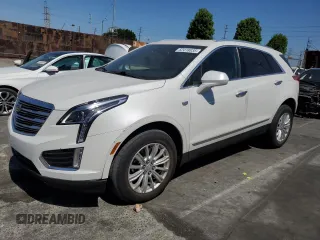 2018 Cadillac XT5 AWD with VIN 1GYKNBRS0JZ128529, listed as a Copart auction lot 62418835 with 50,051 mi miles and Salvage title. Bid and sale history available at DreamBid. Image 1.