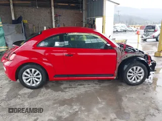 2017 Volkswagen Beetle Fleet with VIN 3VWF17AT6HM614856, listed as a IAAI auction lot 41942634 with 61,872 mi miles and . Bid and sale history available at DreamBid. Image 14.