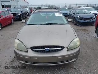 2003 Ford Taurus SE with VIN 1FAHP58U83A195059, listed as a IAAI auction lot 41931098 with 211,096 mi miles and . Bid and sale history available at carsss.com. Image 6.