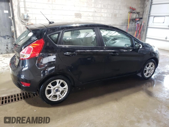 2014 Ford Fiesta SE z VIN 3FADP4EJ7EM145326, wystawiony jako Copart lot #62030855 z przebiegiem 83 625 mil mil oraz Czysty tytuł • Clean title. Historia ofert i sprzedaży dostępna na DreamBid. Obrazek 3.