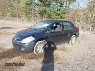 2010 Nissan Versa S with VIN 3N1BC1AP9AL361302, listed as a IAAI auction lot 42102135 with 127,849 mi miles and . Bid and sale history available at DreamBid. Image 2.