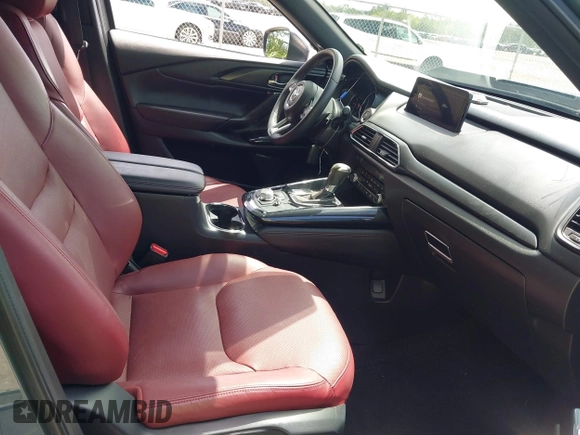 2021 Mazda CX-9 Carbon Edition with VIN JM3TCADY3M0517722, listed as a IAAI auction lot 41951164 with 43,868 mi miles and . Bid and sale history available at carsss.com. Image 5.