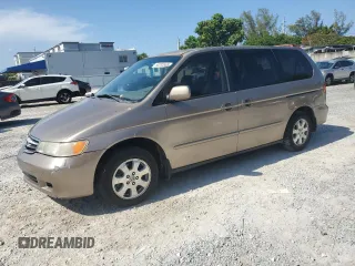 2004 Honda Odyssey EX-RES z VIN 5FNRL18814B125773, wystawiony jako Copart lot #58205565 z przebiegiem 250 732 mil mil oraz Szkoda całkowita • Salvage title. Historia ofert i sprzedaży dostępna na DreamBid. Obrazek 1.