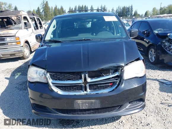 2012 Dodge Grand Caravan SXT with VIN 2C4RDGCG2CR319651, listed as a IAAI auction lot 42097594 with 155,521 mi miles and . Bid and sale history available at DreamBid. Image 6.