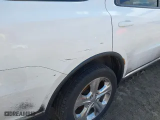 2014 Dodge Durango Limited with VIN 1C4RDJDG9EC345400, listed as a IAAI auction lot 42023709 with 145,316 mi miles. Bid and sale history available at carsss.com. Image 6.