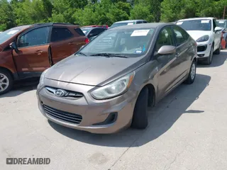 2013 Hyundai Accent GLS with VIN KMHCT4AE5DU359702, listed as a IAAI auction lot 42019779 with 113,162 mi miles. Bid and sale history available at carsss.com. Image 2.