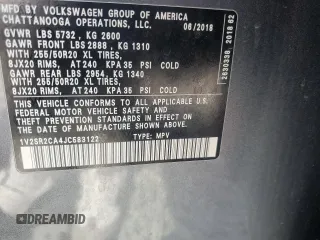 2018 Volkswagen Atlas SEL z VIN 1V2SR2CA4JC583122, wystawiony jako Copart lot #52748205 z przebiegiem 86 071 mil mil oraz Szkoda całkowita • Salvage title. Historia ofert i sprzedaży dostępna na DreamBid. Obrazek 13.