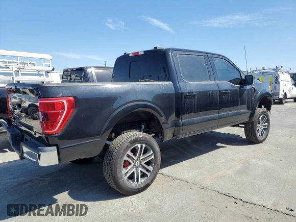 2021 Ford F-150 XL with VIN 1FTFW1E54MFD11453, listed as a Copart auction lot 50240015 with 8,645 mi miles and Salvage title. Bid and sale history available at DreamBid. Image 3.