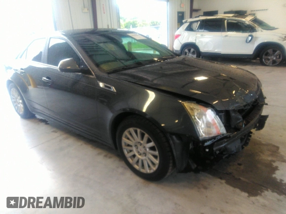 2013 Cadillac CTS Luxury with VIN 1G6DE5E54D0156491, listed as a IAAI auction lot 39844556 with 104,089 mi miles and . Bid and sale history available at DreamBid. Image 1.