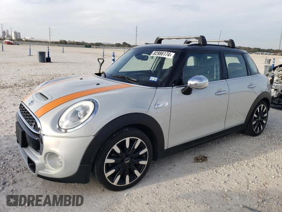 2015 MINI Cooper Hardtop 4 Door S with VIN WMWXU3C50F2B65944, listed as a Copart auction lot 82986174 with 121,207 mi miles and Clean Title. Bid and sale history available at carsss.com. Image 1.