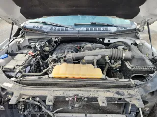 2018 Ford F-150 XL z VIN 1FTEX1CB1JKE34115, wystawiony jako Copart lot #59614915 z przebiegiem 58 265 mil mil oraz Szkoda całkowita • Salvage title. Historia ofert i sprzedaży dostępna na DreamBid. Obrazek 11.