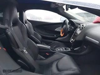 2020 McLaren GT with VIN SBM22GCA1LW000498, listed as a IAAI auction lot 41265247 with 18,465 mi miles. Bid and sale history available at carsss.com. Image 5.