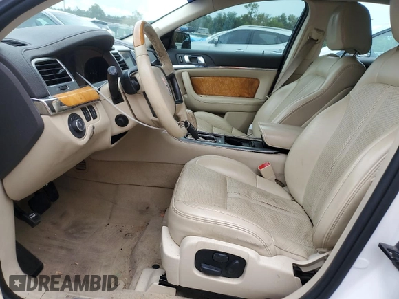 2011 Lincoln MKS z VIN 1LNHL9DRXBG609478, wystawiony jako Copart lot #57226135 z przebiegiem 178 372 mil mil oraz Szkoda całkowita • Salvage title. Historia ofert i sprzedaży dostępna na DreamBid. Obrazek 7.