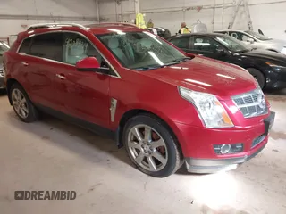 2012 Cadillac SRX Performance Collection with VIN 3GYFNEE36CS657582, listed as a IAAI auction lot 42084319 with 171,335 mi miles. Bid and sale history available at carsss.com. Image 1.
