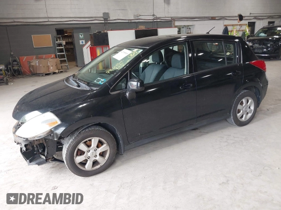 2009 Nissan Versa 1.8 S with VIN 3N1BC13E79L394807, listed as a IAAI auction lot 42198905 with 77,245 mi miles. Bid and sale history available at carsss.com. Image 2.