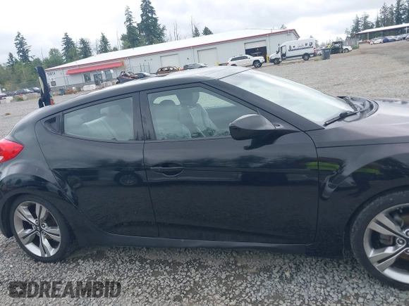 2012 Hyundai Veloster w/Gray Int with VIN KMHTC6AD4CU062034, listed as a IAAI auction lot 42371790 with 116,861 mi miles and . Bid and sale history available at DreamBid. Image 13.