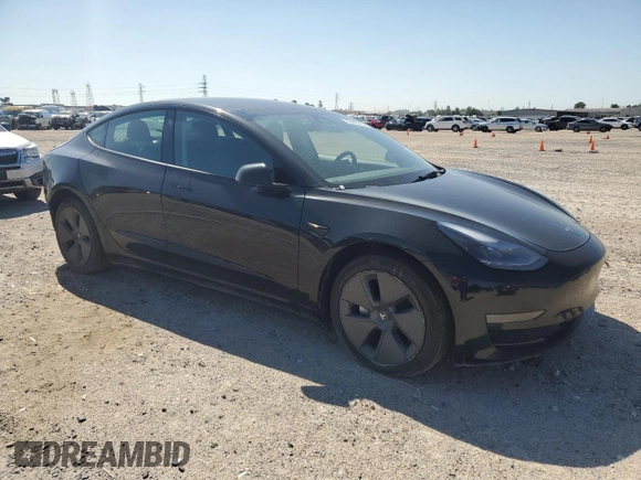 2023 Tesla Model 3 with VIN 5YJ3E1EA1PF456896, listed as a Copart auction lot 50423785 with 49,316 mi miles and Salvage title. Bid and sale history available at DreamBid. Image 4.