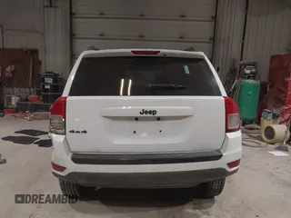 2012 Jeep Compass Latitude with VIN 1C4NJDEB0CD676725, listed as a IAAI auction lot 41948874 with 143,833 mi miles. Bid and sale history available at carsss.com. Image 16.