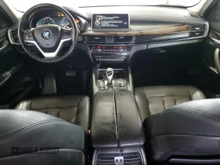 2015 BMW X6 sDrive35i with VIN 5UXKU0C50F0F91865, listed as a Copart auction lot 82128374 with 122,395 mi miles and Salvage Title. Bid and sale history available at carsss.com. Image 8.