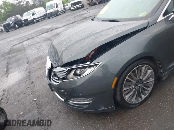 2015 Lincoln MKZ Hybrid z VIN 3LN6L2LU7FR618867, wystawiony jako IAAI lot #42291650 z przebiegiem 109 021 mil mil oraz . Historia ofert i sprzedaży dostępna na DreamBid. Obrazek 6.