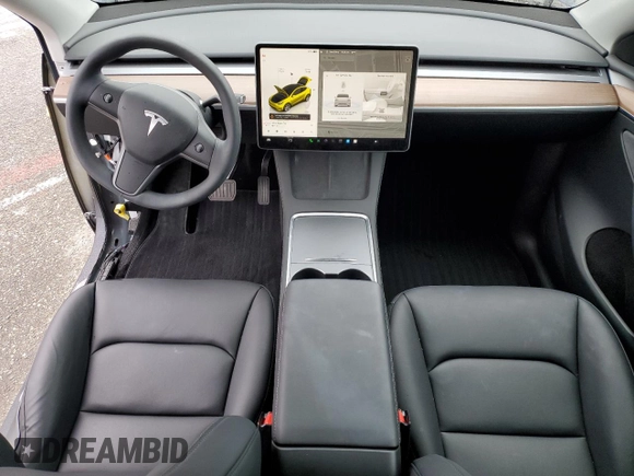 2024 Tesla Model Y with VIN 7SAYGDED5RF093410, listed as a Copart auction lot 50557225 with 6,396 mi miles and Salvage Title. Bid and sale history available at DreamBid. Image 8.
