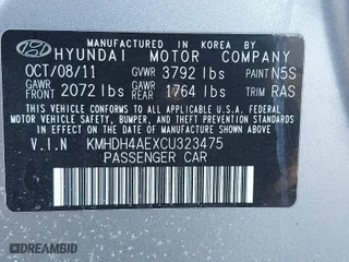 2012 Hyundai Elantra GLS PZEV with VIN KMHDH4AEXCU323475, listed as a IAAI auction lot 41875541 with 134,678 mi miles. Bid and sale history available at carsss.com. Image 9.