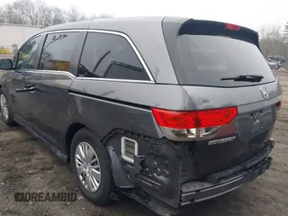 2014 Honda Odyssey LX z VIN 5FNRL5H2XEB009962, wystawiony jako IAAI lot #41902277 z przebiegiem 152 661 mil mil oraz . Historia ofert i sprzedaży dostępna na DreamBid. Obrazek 3.