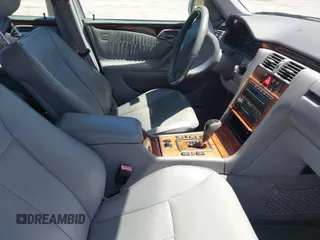 2002 Mercedes-Benz E-Class with VIN WDBJF65J72B441380, listed as a IAAI auction lot 42040268 with 210,471 mi miles. Bid and sale history available at carsss.com. Image 5.