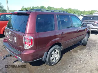 2007 Honda Pilot EX-L with VIN 5FNYF18547B006094, listed as a IAAI auction lot 42297719 with 235,632 mi miles and . Bid and sale history available at DreamBid. Image 4.
