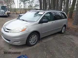 2008 Toyota Sienna XLE with VIN 5TDZK22C28S220219, listed as a IAAI auction lot 41879397 with 210,453 mi miles. Bid and sale history available at carsss.com. Image 2.