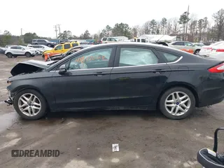 2016 Ford Fusion SE with VIN 3FA6P0HD7GR401848, listed as a IAAI auction lot 41687024 with 124,374 mi miles. Bid and sale history available at carsss.com. Image 14.