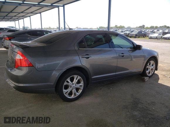 2012 Ford Fusion SE z VIN 3FAHP0HAXCR231865, wystawiony jako Copart lot #52644815 z przebiegiem 153 058 mil mil oraz Szkoda całkowita • Salvage title. Historia ofert i sprzedaży dostępna na DreamBid. Obrazek 3.
