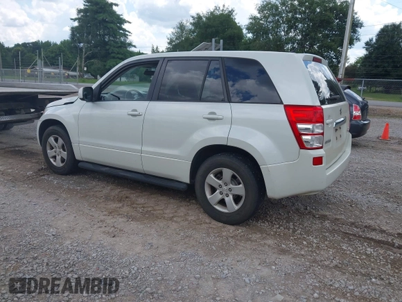 2013 Suzuki Grand Vitara Premium with VIN JS3TE0D68D4100201, listed as a IAAI auction lot 42694457 with 126,585 mi miles and . Bid and sale history available at DreamBid. Image 3.