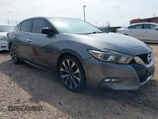 2016 Nissan Maxima SV z VIN 1N4AA6AP0GC400543, wystawiony jako IAAI lot #42275635 z przebiegiem 98 492 mil mil oraz . Historia ofert i sprzedaży dostępna na DreamBid. Obrazek 1.