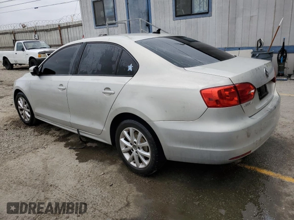2011 Volkswagen Jetta SE with VIN 3VWDZ7AJXBM379724, listed as a Copart auction lot 62309775 with 138,164 mi miles and Clean title. Bid and sale history available at DreamBid. Image 2.