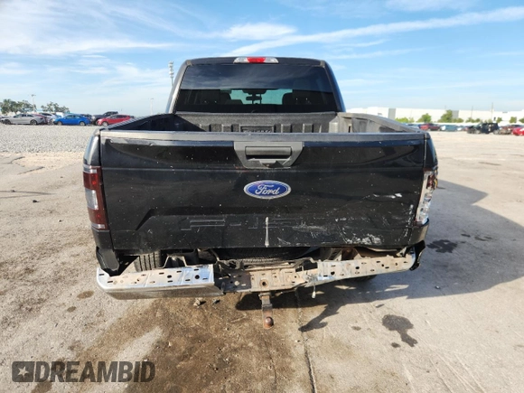 2019 Ford F-150 XL with VIN 1FTEW1CB6KFB18660, listed as a Copart auction lot 61156835 with 90,084 mi miles and Salvage title. Bid and sale history available at DreamBid. Image 6.