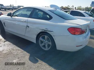 2015 BMW 4 Series 428i with VIN WBA3N7C54FK225367, listed as a IAAI auction lot 41958685 with 142,104 mi miles. Bid and sale history available at carsss.com. Image 3.