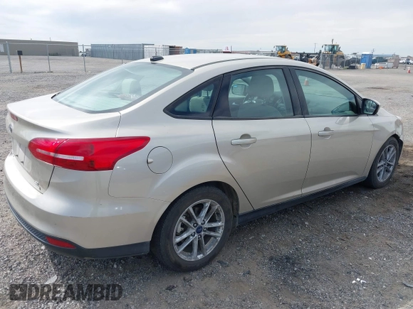 2018 Ford Focus SE with VIN 1FADP3FE7JL230870, listed as a IAAI auction lot 42021541 with 84,000 mi miles. Bid and sale history available at carsss.com. Image 4.