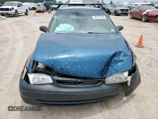 1998 Toyota Corolla VE with VIN 2T1BR18E6WC072503, listed as a Copart auction lot 58751795 with 306,052 mi miles and Salvage title. Bid and sale history available at DreamBid. Image 5.