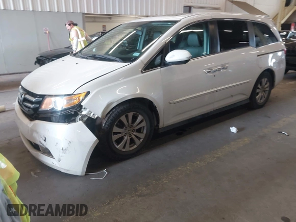 2014 Honda Odyssey EX-L with VIN 5FNRL5H60EB030841, listed as a IAAI auction lot 42271401 with 107,343 mi miles and . Bid and sale history available at DreamBid. Image 2.