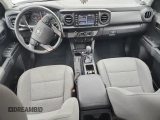 2021 Toyota Tacoma SR with VIN 3TYAX5GN2MT016481, listed as a Copart auction lot 58475465 with 62,679 mi miles and Salvage title. Bid and sale history available at DreamBid. Image 8.
