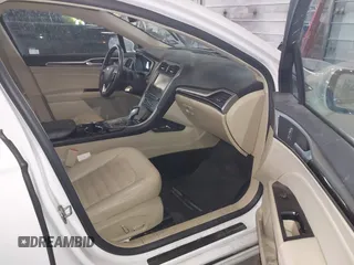 2016 Ford Fusion SE with VIN 3FA6P0T94GR268243, listed as a IAAI auction lot 41690685 with 63,327 mi miles. Bid and sale history available at carsss.com. Image 5.