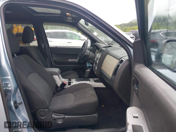 2008 Mercury Mariner with VIN 4M2CU91178KJ12057, listed as a IAAI auction lot 42358190 with 100,000 mi miles and . Bid and sale history available at DreamBid. Image 5.