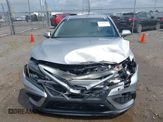 2021 Toyota Camry SE Nightshade with VIN 4T1T11AK3MU542610, listed as a IAAI auction lot 39350024 with 71,086 mi miles and . Bid and sale history available at DreamBid. Image 12.