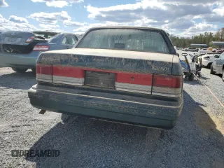 1993 Plymouth Acclaim z VIN 1P3XA4634PF673210, wystawiony jako Copart lot #75919254 z przebiegiem 186 440 mil mil oraz Szkody całkowita. Historia ofert i sprzedaży dostępna na DreamBid. Obrazek 6.