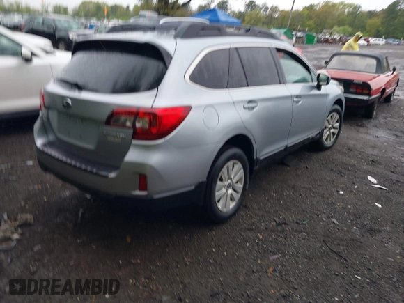 2015 Subaru Outback Premium with VIN 4S4BSACC7F3234427, listed as a IAAI auction lot 42171329 with 51,332 mi miles and . Bid and sale history available at DreamBid. Image 4.